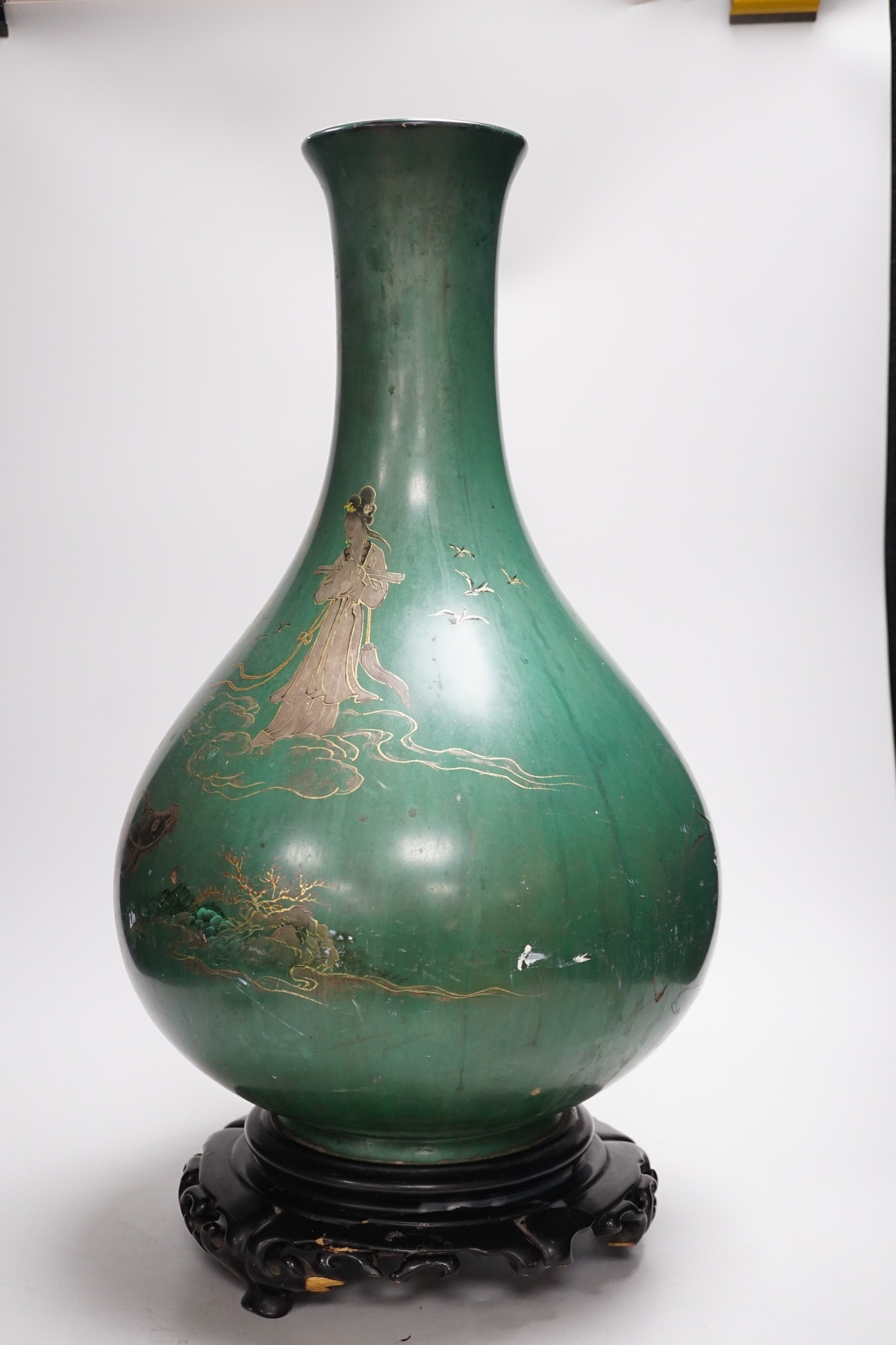 A large Chinese Fuzhou lacquer green ground vase and stand, early 20th century, 54 cm high